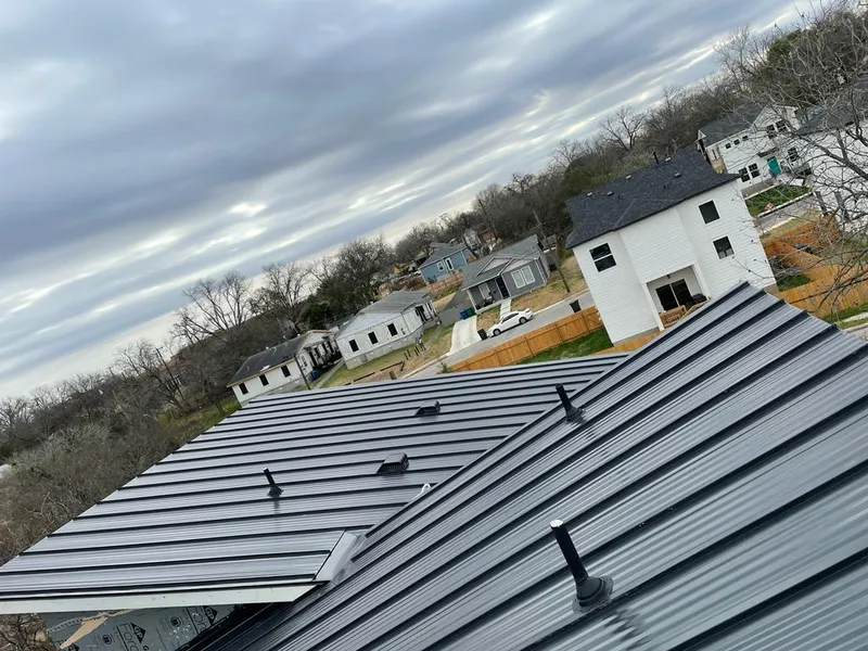 Standing seam metal roof panels with vents for Skylight Repair in Marshall